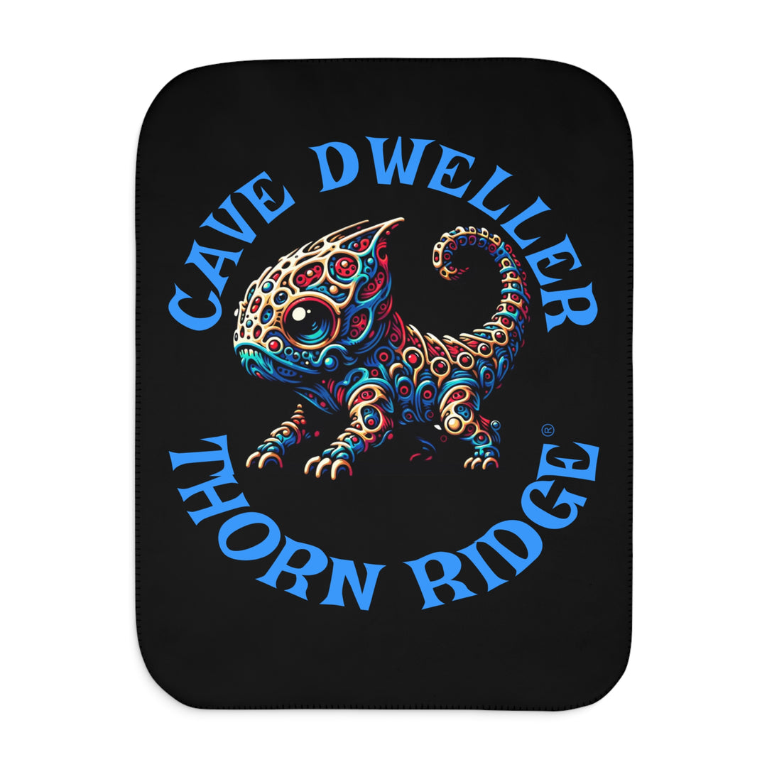 Cave Dweller by Thorn Ridge® black sherpa blanket featuring a weird lizard creature.