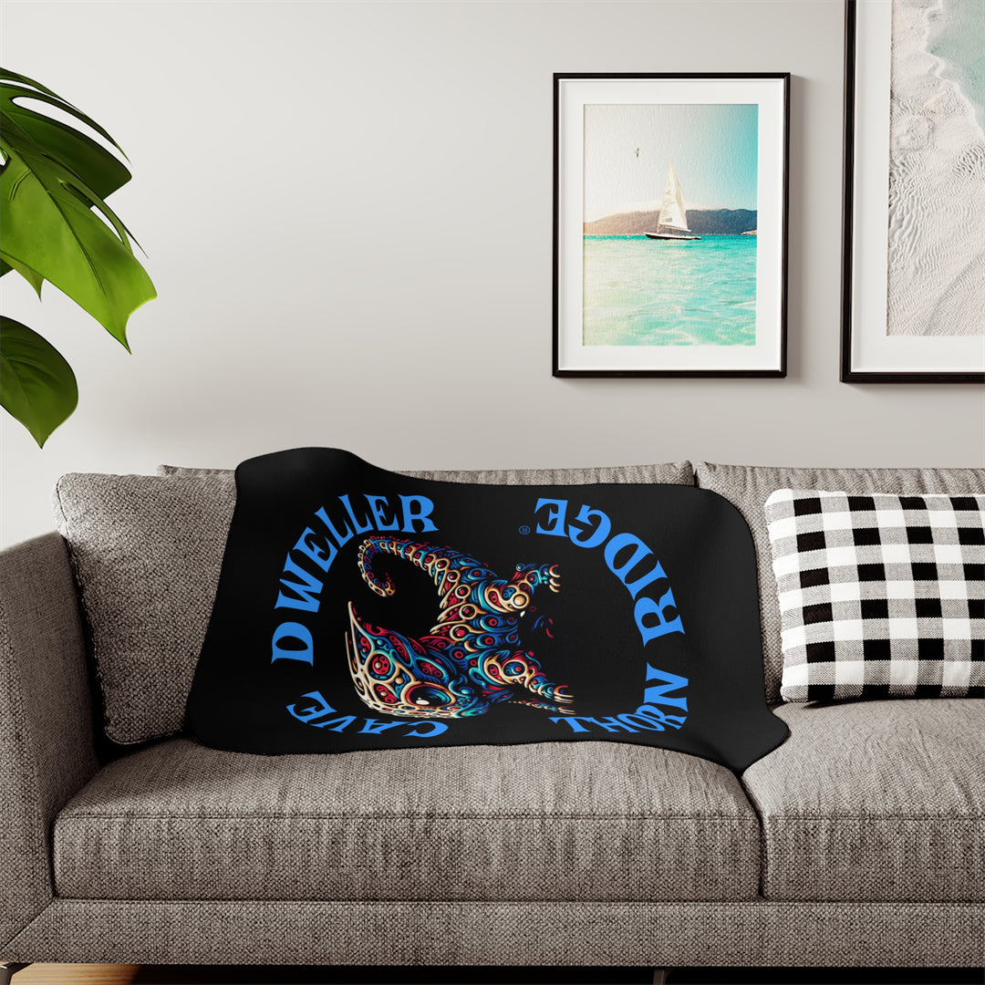 Cave Dweller by Thorn Ridge® black sherpa blanket featuring a weird lizard creature.