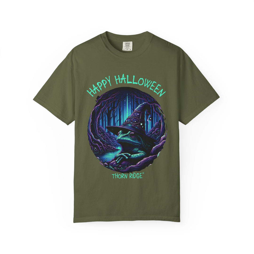 Happy Halloween from The Frog Witch labeled Thorn Ridge. Frog with a witches hat sitting by a dark stream in a wicked forest. 