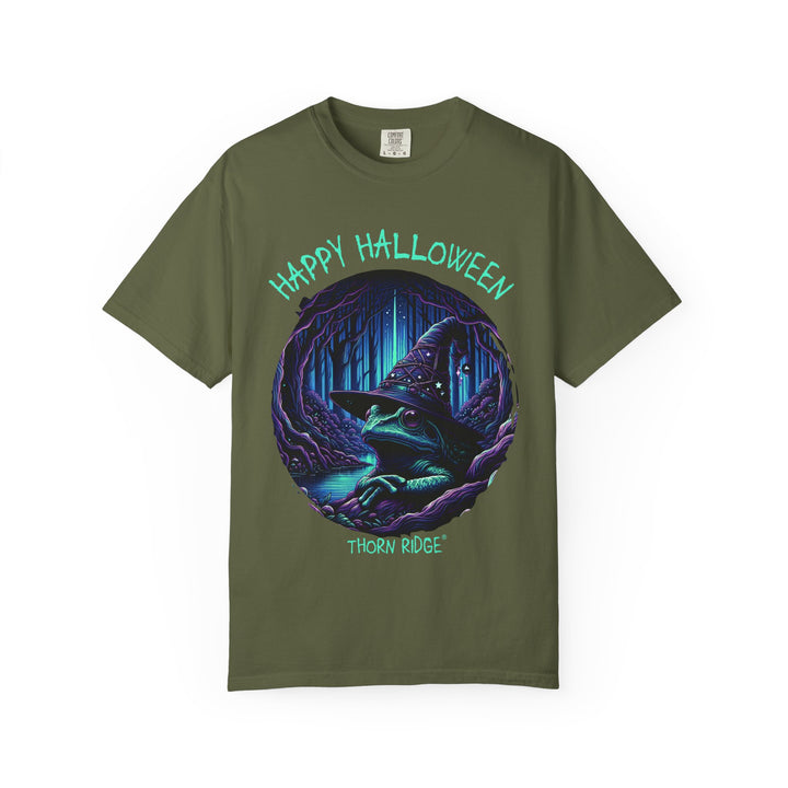 Happy Halloween from The Frog Witch labeled Thorn Ridge. Frog with a witches hat sitting by a dark stream in a wicked forest. 