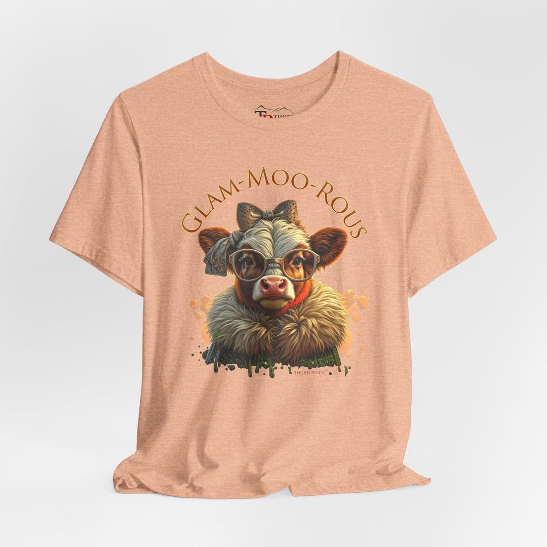 "Glam-Moo-Rous" Graphic Tee with a  Cow in brown tones with sunglasses and bows on her head and a boa around her neck. Labeled Thorn Ridge®