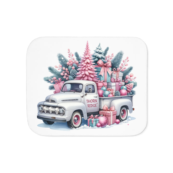 Vintage truck decorated with Christmas trees and presents on a white background with Thorn Ridge® branding on the door.