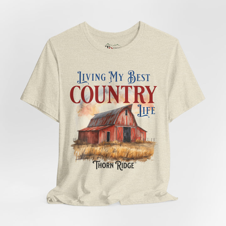 t-shirt with a graphic of a red barn and text 'Living My Best Country Life' branded Thorn Ridge®