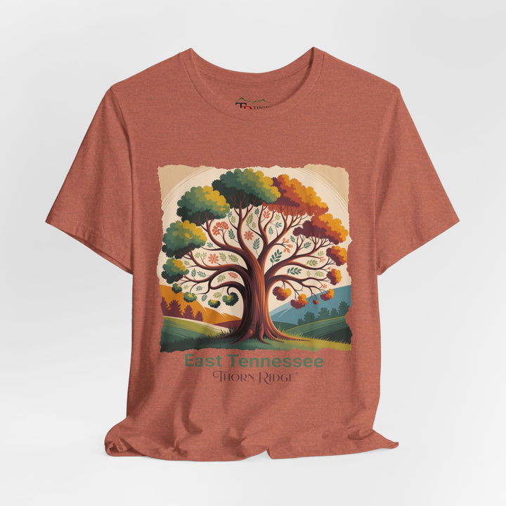 t-shirt with a colorful tree design and 'East Tennessee Thorn Ridge' text showing leaves changing during the fall of the year. 