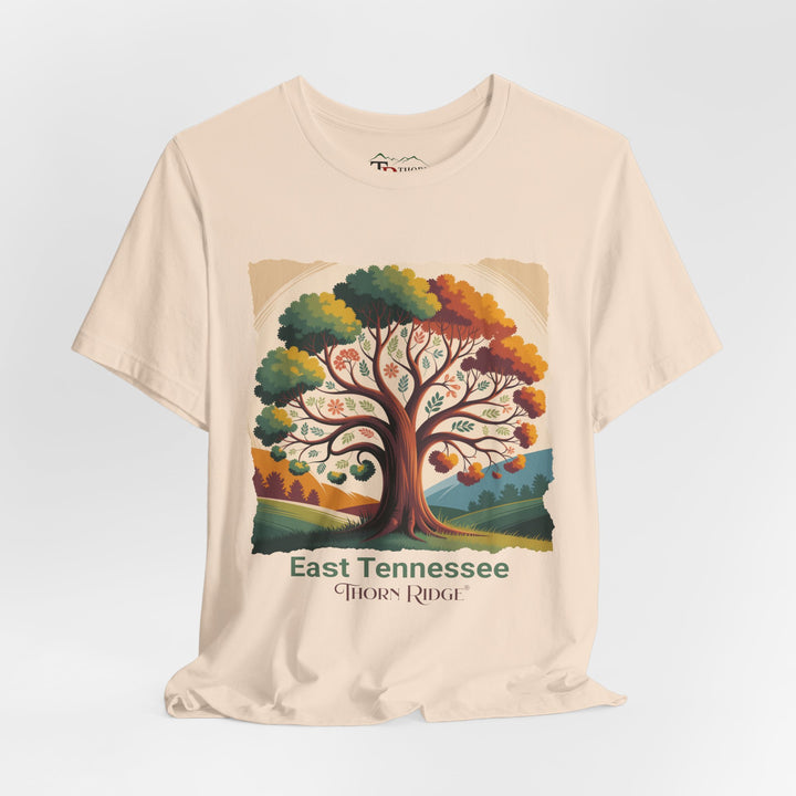 t-shirt with a colorful tree design and 'East Tennessee Thorn Ridge' text showing leaves changing during the fall of the year. 