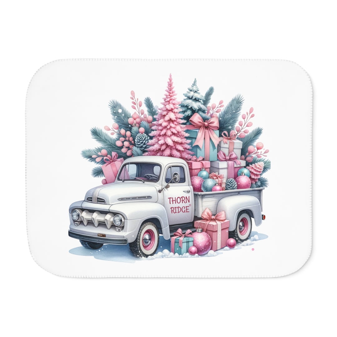 Vintage truck decorated with Christmas trees and presents on a white background with Thorn Ridge® branding on the door.
