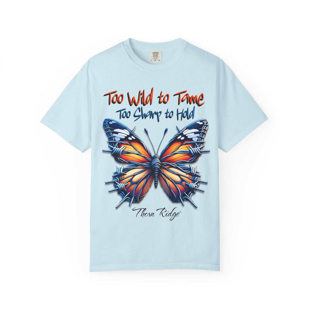 Too Wild To Tame Too Sharp To Hold Graphic Tee with a butterfly with barbed wire wings labeled Thorn Ridge. 