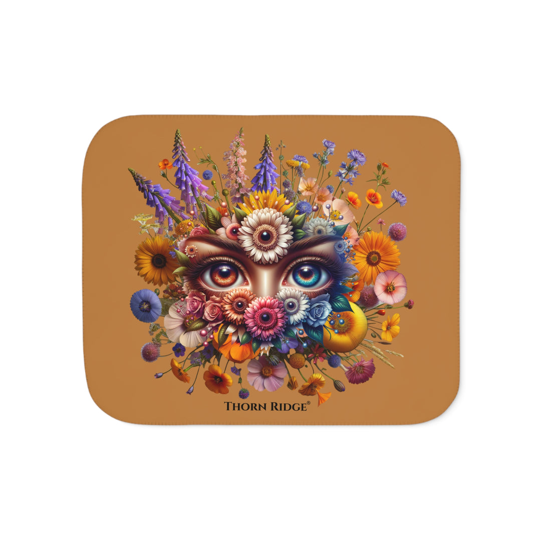 Colorful floral design with eyes on a brown background, featuring the brand 'Thorn Ridge'.