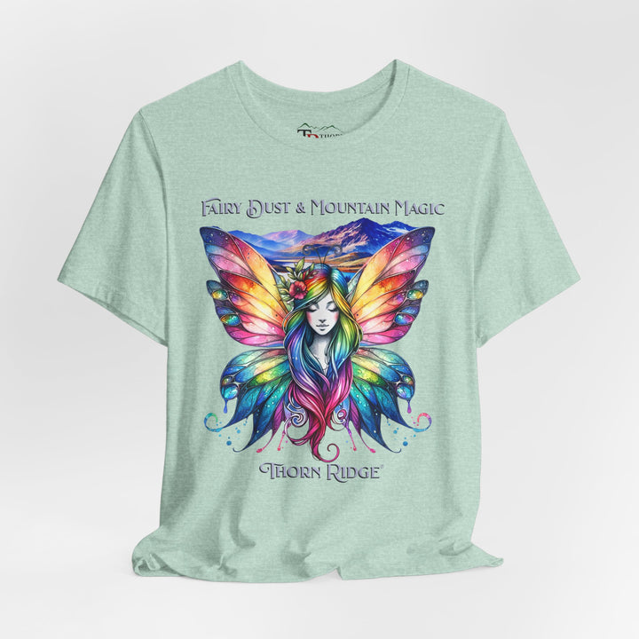 Fairy Dust and Mountain Magic graphic tee with a winged fairy in the front and mountains in the background labeled Thorn Ridge®