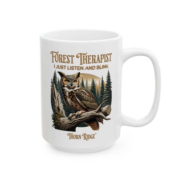 White mug with an owl design and text Forest Therapist by Thorn Ridge®