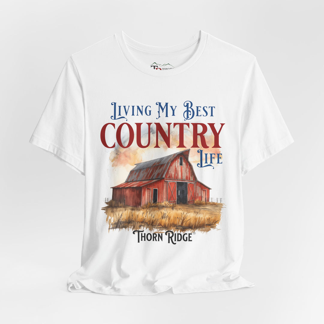 t-shirt with a graphic of a red barn and text 'Living My Best Country Life' branded Thorn Ridge®