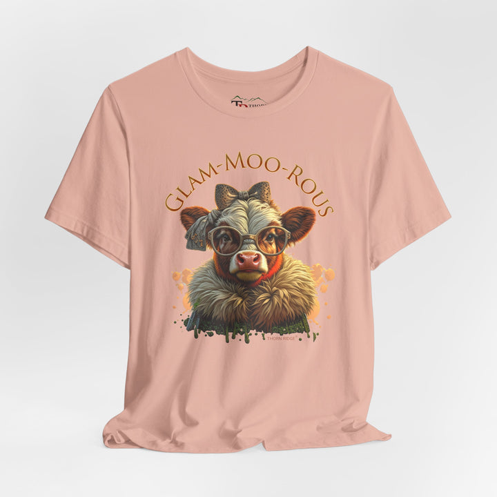 "Glam-Moo-Rous" Graphic Tee with a  Cow in brown tones with sunglasses and bows on her head and a boa around her neck. Labeled Thorn Ridge®