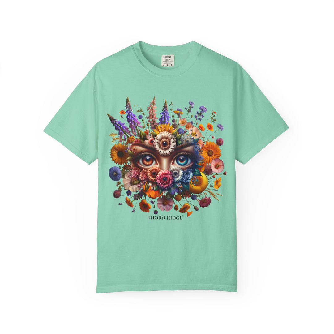 t-shirt with a colorful floral design and eyes in the center that seem like they're watching you. Branded Thorn Ridge®.