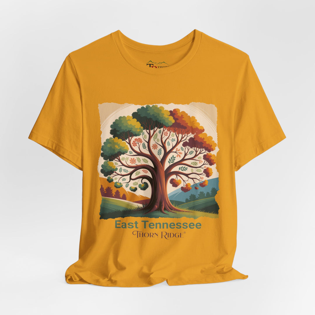 t-shirt with a colorful tree design and 'East Tennessee Thorn Ridge' text showing leaves changing during the fall of the year. 
