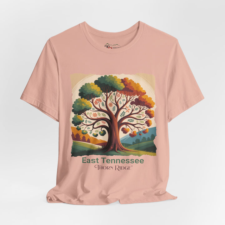 t-shirt with a colorful tree design and 'East Tennessee Thorn Ridge' text showing leaves changing during the fall of the year. 