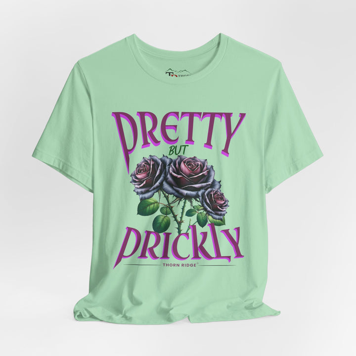 Pretty But Prickly Thorn Ridge Roses Branded t-shirt in purple with black and purple roses. 