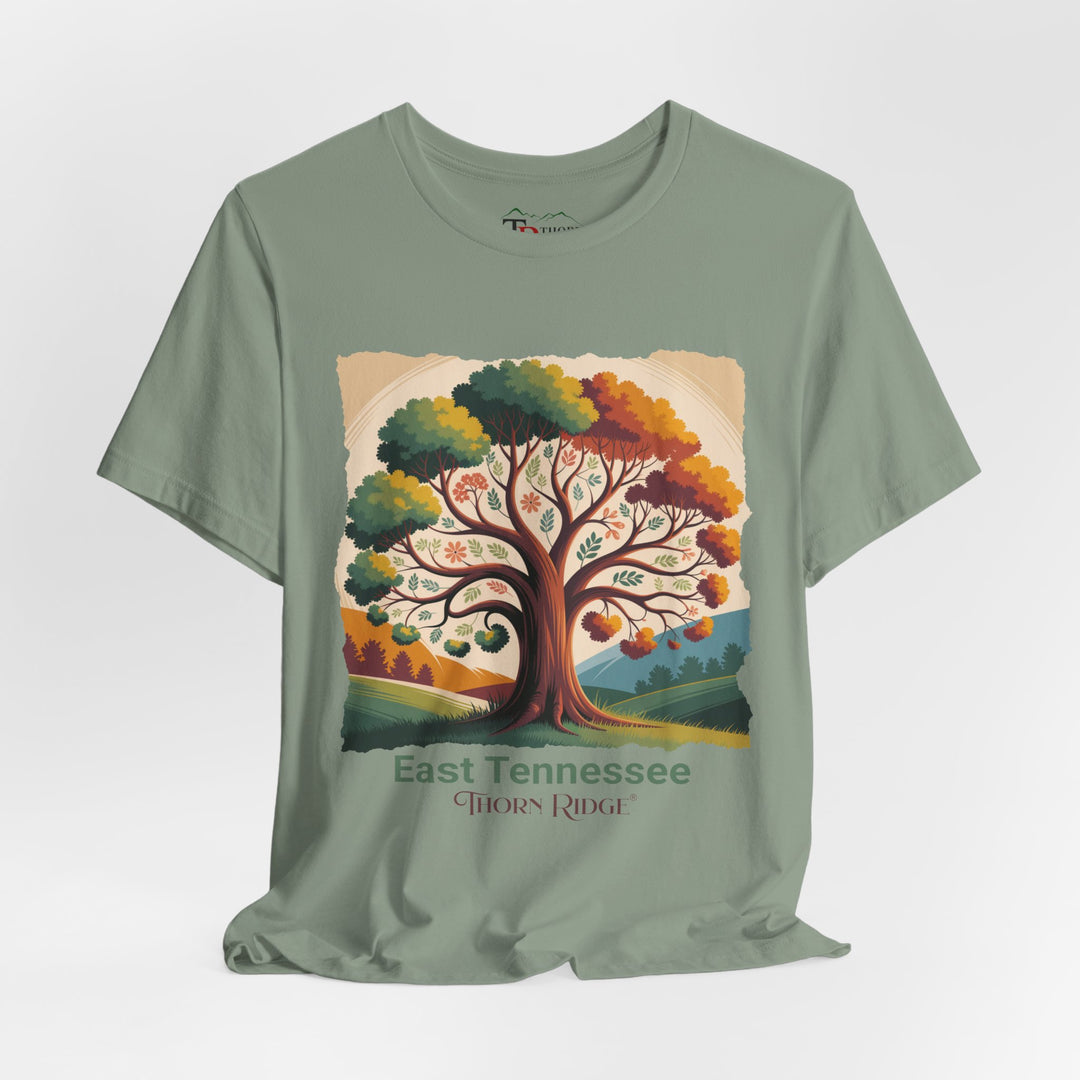 t-shirt with a colorful tree design and 'East Tennessee Thorn Ridge' text showing leaves changing during the fall of the year. 