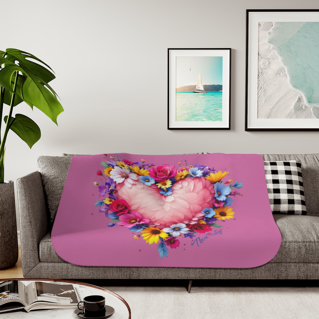 Feathers & Flowers Heart Sherpa Blanket in pinks with a feather heart surrounded by flowers by Thorn Ridge®