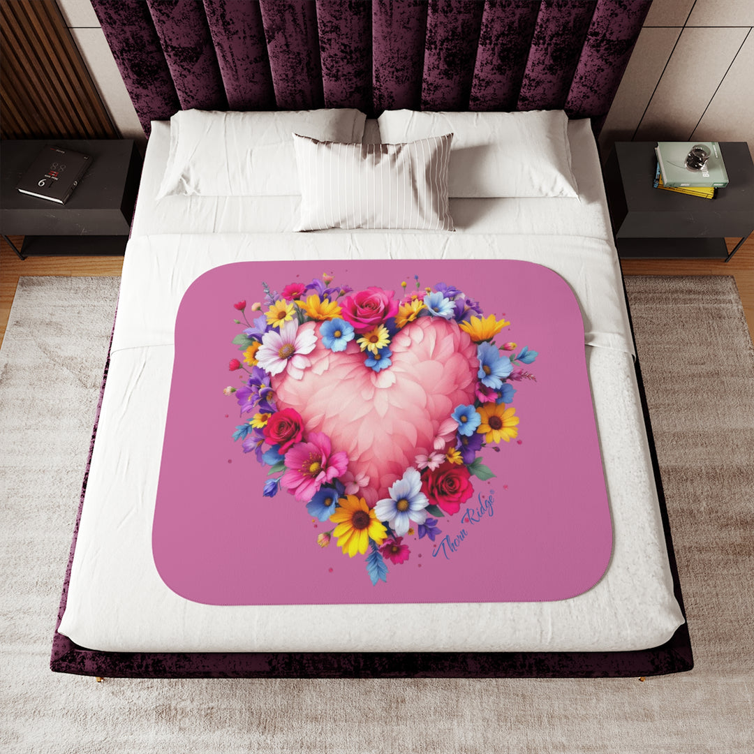 Feathers & Flowers Heart Sherpa Blanket in pinks with a feather heart surrounded by flowers by Thorn Ridge®