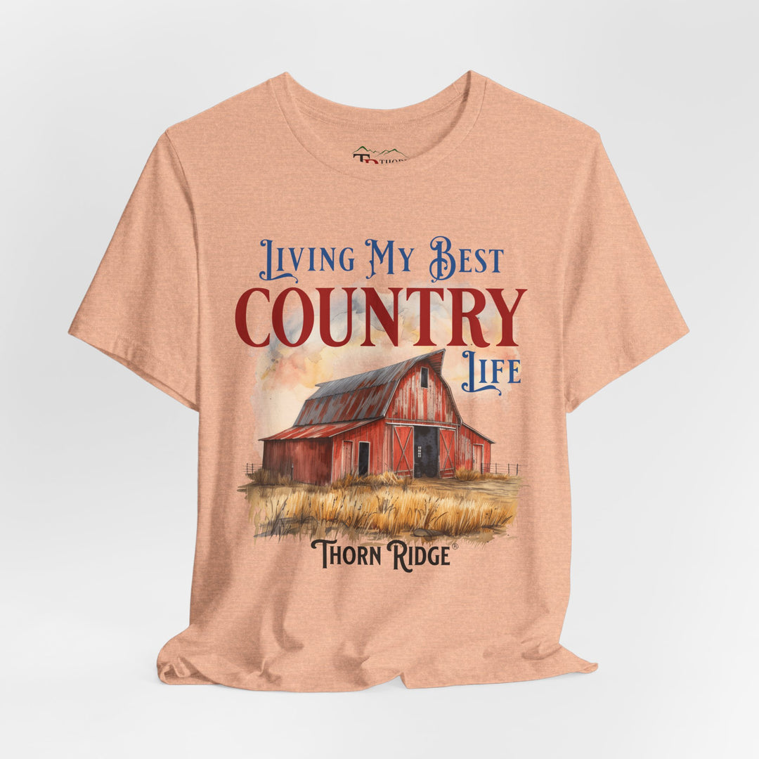 t-shirt with a graphic of a red barn and text 'Living My Best Country Life' branded Thorn Ridge®