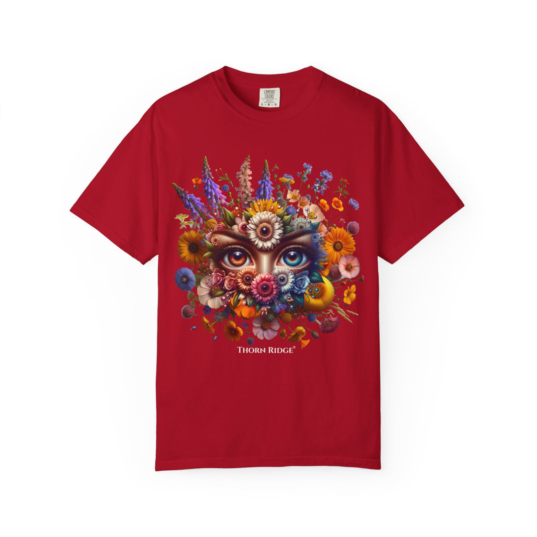 t-shirt with a colorful floral design and eyes in the center that seem like they're watching you. Branded Thorn Ridge®.