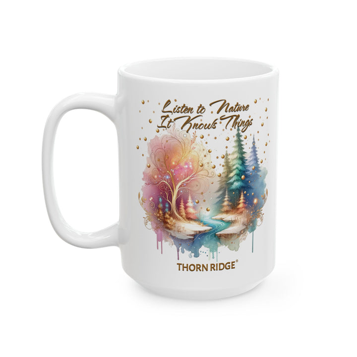 Listen to Nature It Knows Things mug by Thorn Ridge® showing a pastel forest scene with a river running through it. 