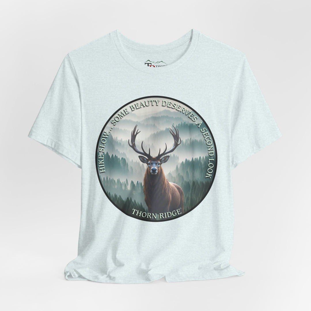 Hike Slow Some Beauty Deserves a Second Look tee with deer and mountains within a circular graphic by Thorn Ridge®