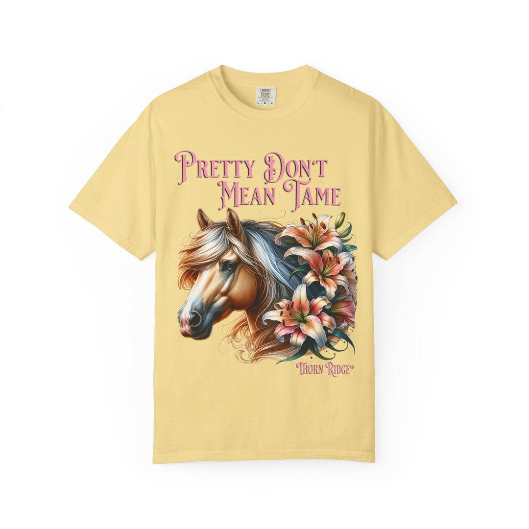 Pretty Don't Mean Tame graphic tee with a horse head and flowers branded to Thorn Ridge®