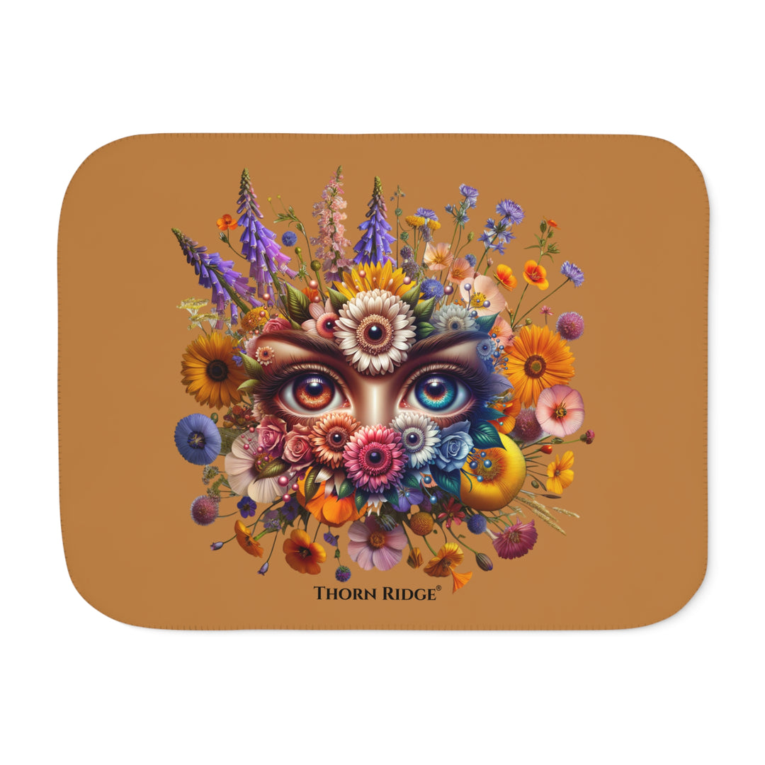 Colorful floral design with eyes on a brown background, featuring the brand 'Thorn Ridge'.