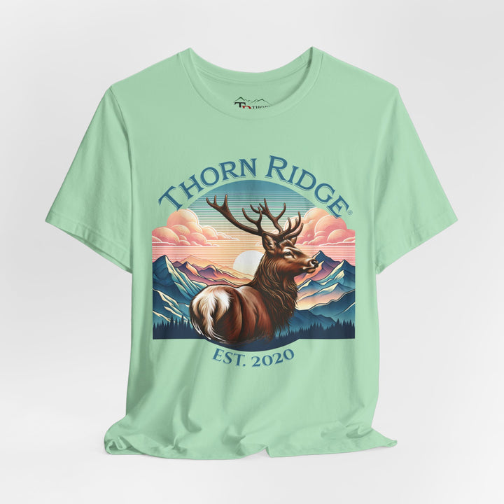 Guardian Buck Tee of a white tailed buck looking out across the mountains labeled Thorn Ridge®