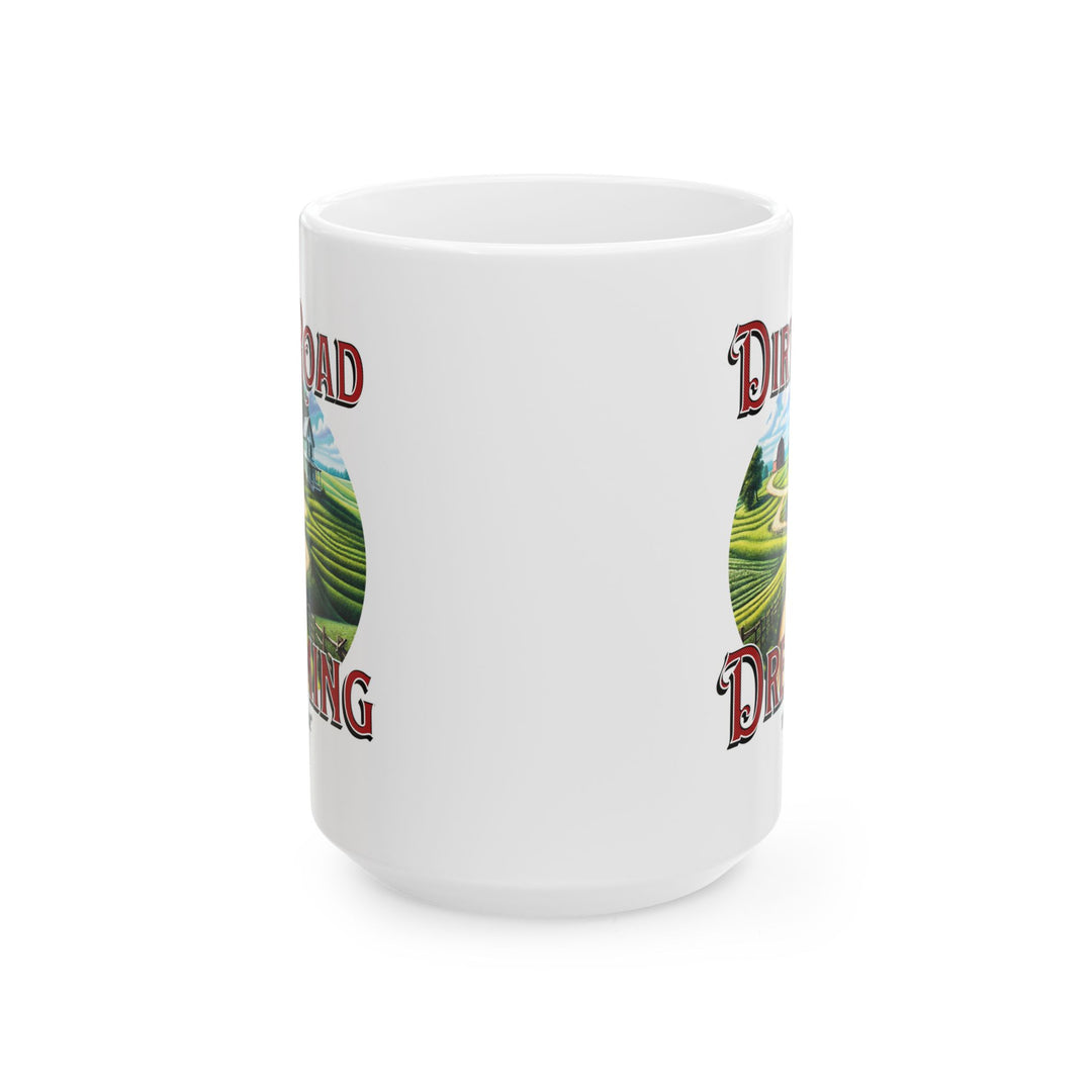 White mug with 'Dirt Road Dreaming' design featuring a rural scene of a farmhouse and feilds by Thorn Ridge®