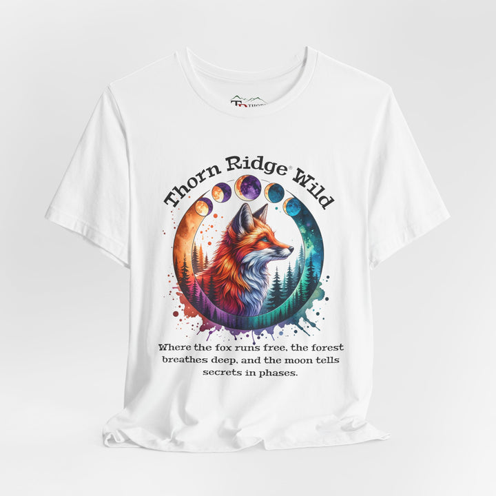 Thorn Ridge Wild Graphic Tee featuring a fox, forest, and moon phases. 
