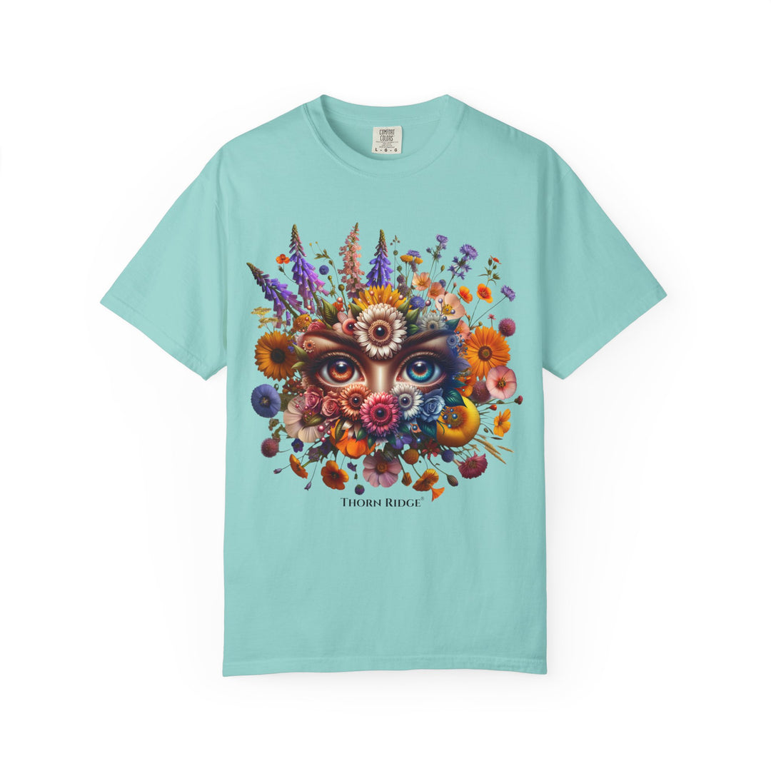 t-shirt with a colorful floral design and eyes in the center that seem like they're watching you. Branded Thorn Ridge®.