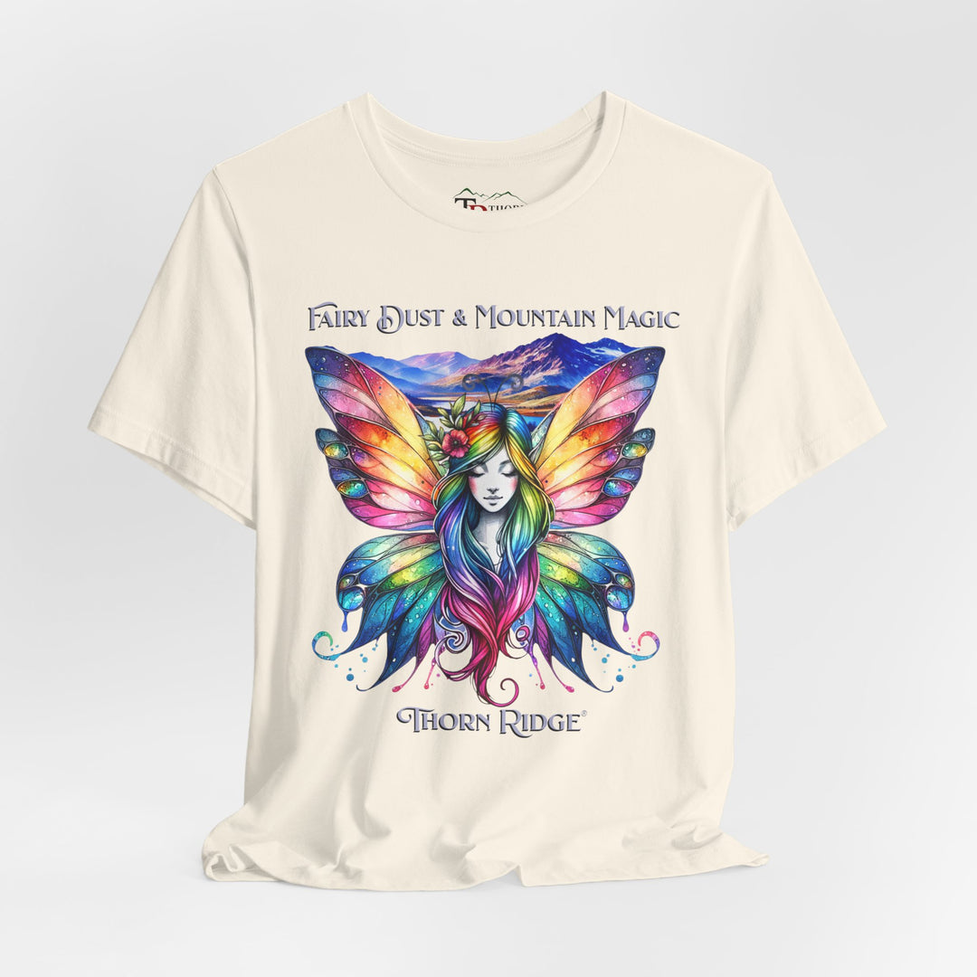 Fairy Dust and Mountain Magic graphic tee with a winged fairy in the front and mountains in the background labeled Thorn Ridge®