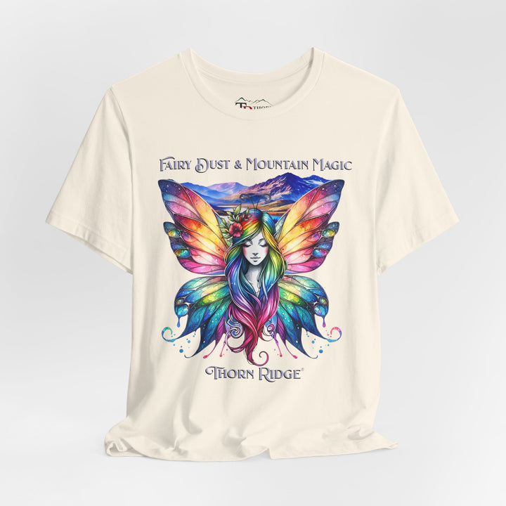 Fairy Dust and Mountain Magic graphic tee with a winged fairy in the front and mountains in the background labeled Thorn Ridge®