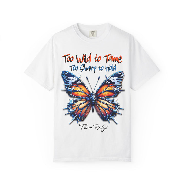 Too Wild To Tame Too Sharp To Hold Graphic Tee with a butterfly with barbed wire wings labeled Thorn Ridge. 
