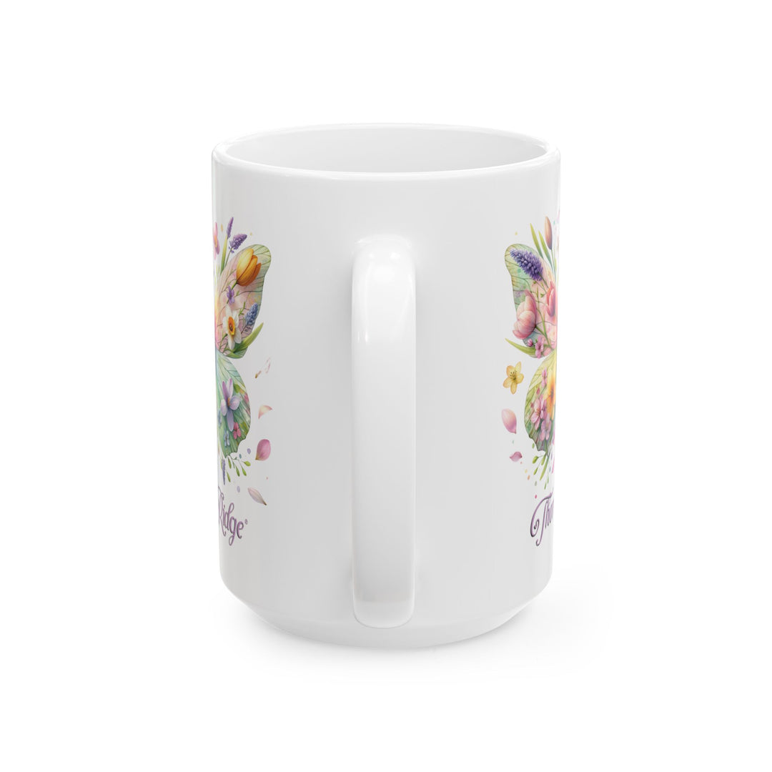 White mug with a colorful butterfly and floral design by Thorn Ridge®