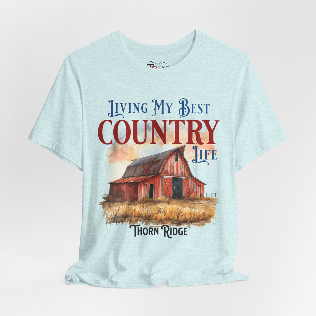 t-shirt with a graphic of a red barn and text 'Living My Best Country Life' branded Thorn Ridge®