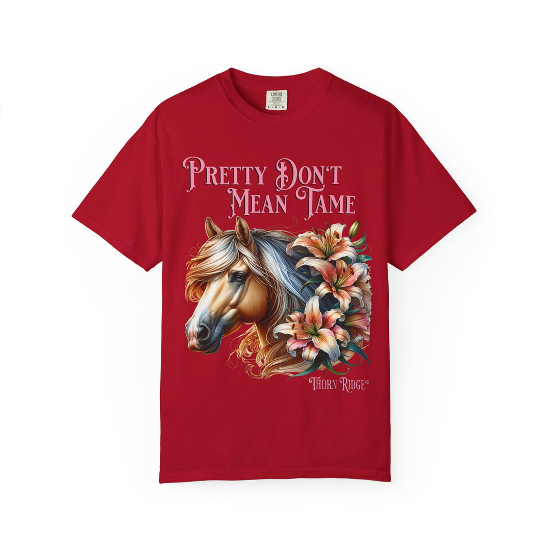 Pretty Don't Mean Tame graphic tee with a horse head and flowers branded to Thorn Ridge®