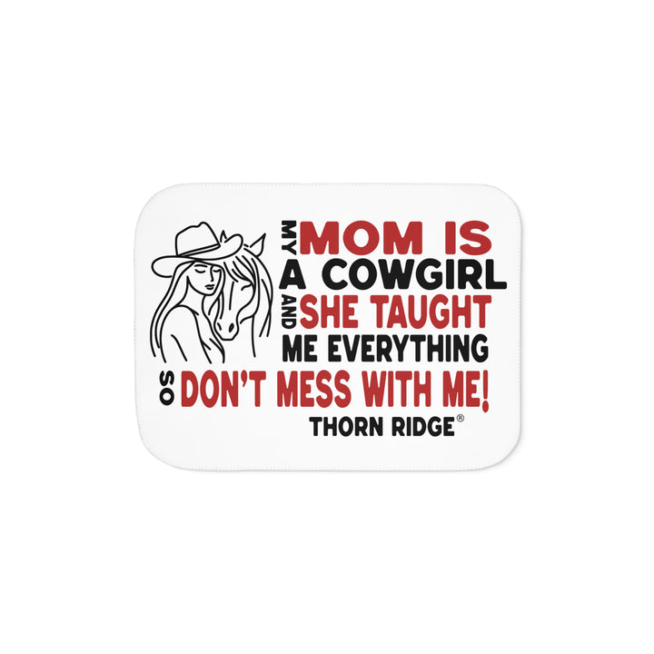 Mom Is A Cowgirl and she taught me everything so don't mess with me slogan graphic with a outline drawing of a woman with a cowboy hat hugging a horse by Thorn Ridge®