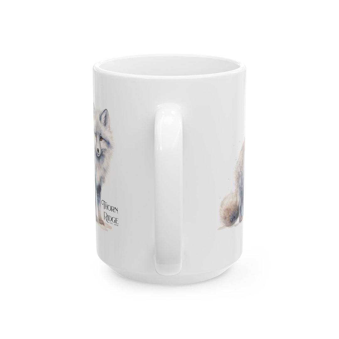 White mug with a graphic of a standing artic fox and 'Thorn Ridge' text on a white background