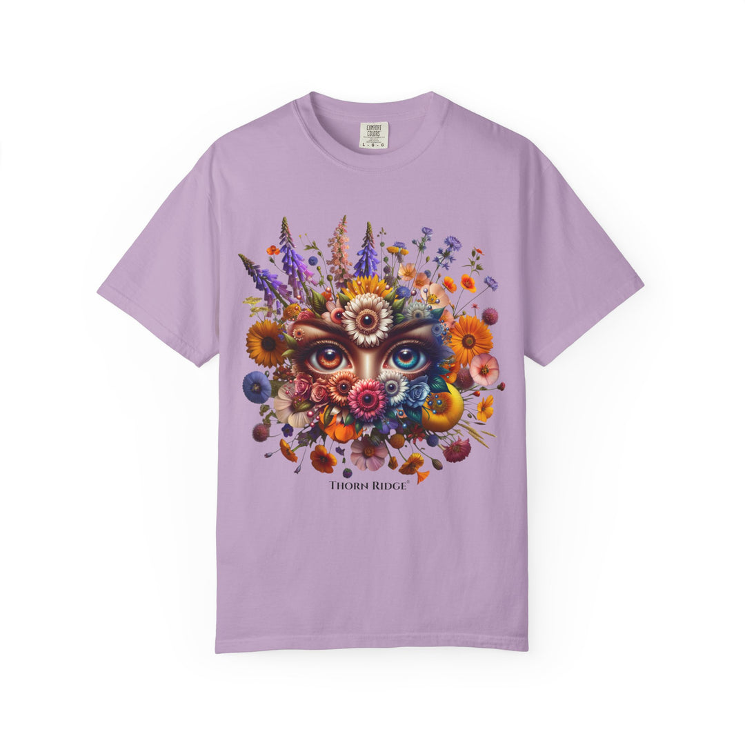 t-shirt with a colorful floral design and eyes in the center that seem like they're watching you. Branded Thorn Ridge®.
