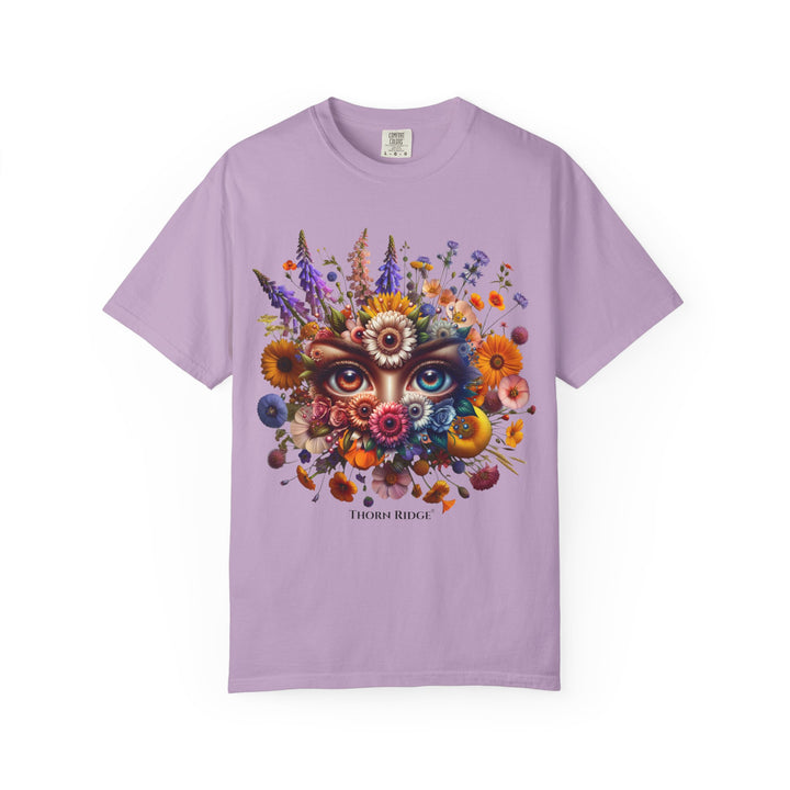 t-shirt with a colorful floral design and eyes in the center that seem like they're watching you. Branded Thorn Ridge®.