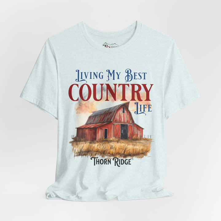 t-shirt with a graphic of a red barn and text 'Living My Best Country Life' branded Thorn Ridge®