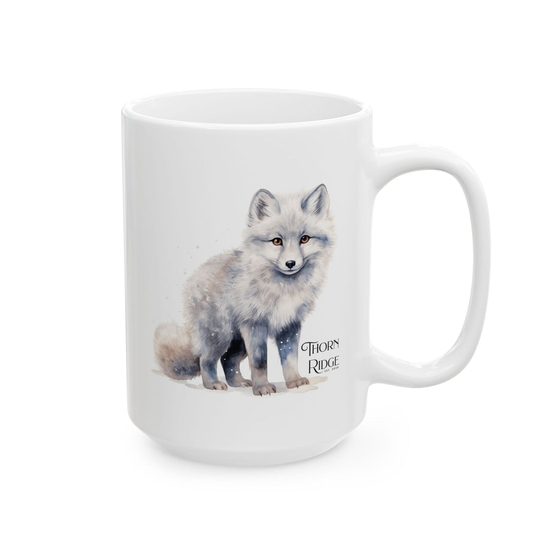 White mug with a graphic of a standing artic fox and 'Thorn Ridge' text on a white background
