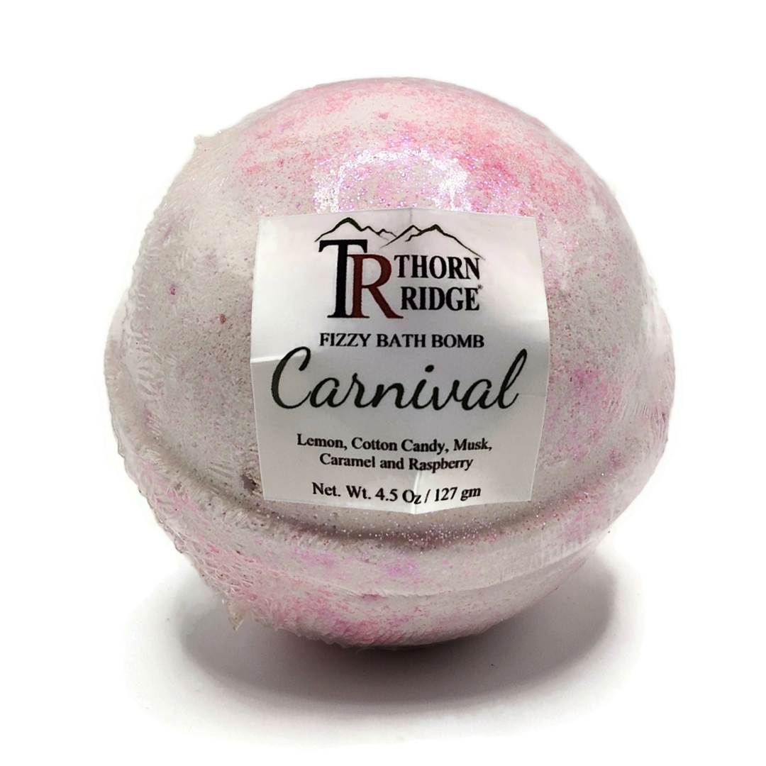 A Thorn Ridge fizzy bath bomb labeled "Carnival," described as a lemon, cotton candy, musk, caramel and raspberry  fragrance. 4.5 oz.