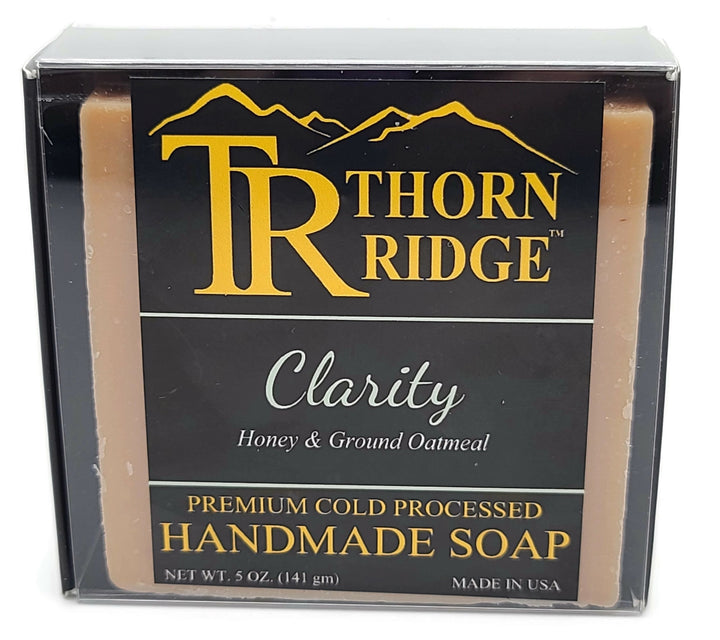 Packaging of Thorn Ridge soap labeled "Clarity," described as honey, ground oatmeal, premium cold processed, handmade, 5 oz. Made in USA.