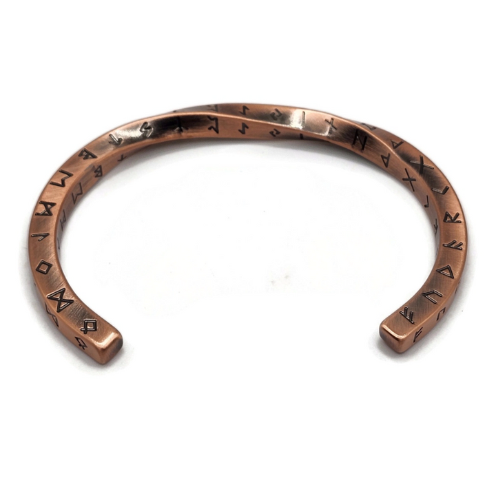 Copper rune twist bracelet with engraved rune symbols. Stainless steel.