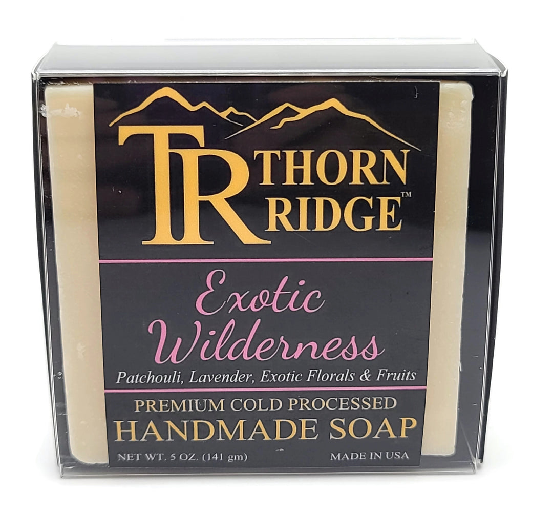 Packaging of Thorn Ridge soap labeled "Exotic Wilderness," described as patchouli, lavender, exotic florals, fruits, premium cold processed, handmade, 5 oz. Made in USA. 