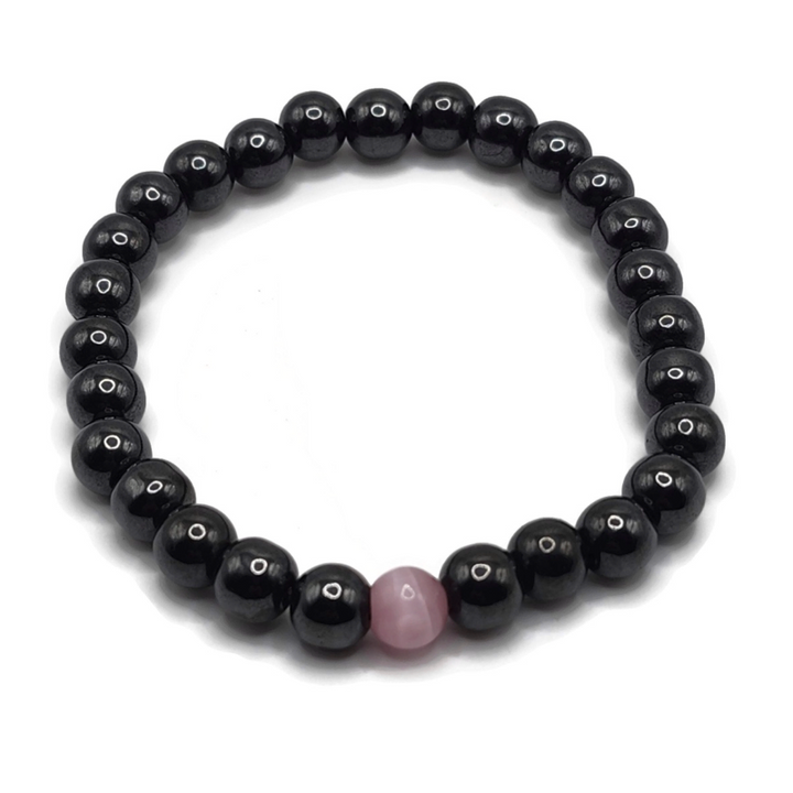 Magnetic bracelet with a pink gemstone.